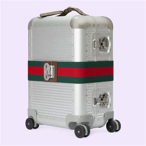 gucci trolley with strap.